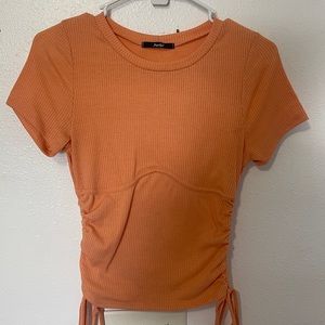 Light orange range cinched top